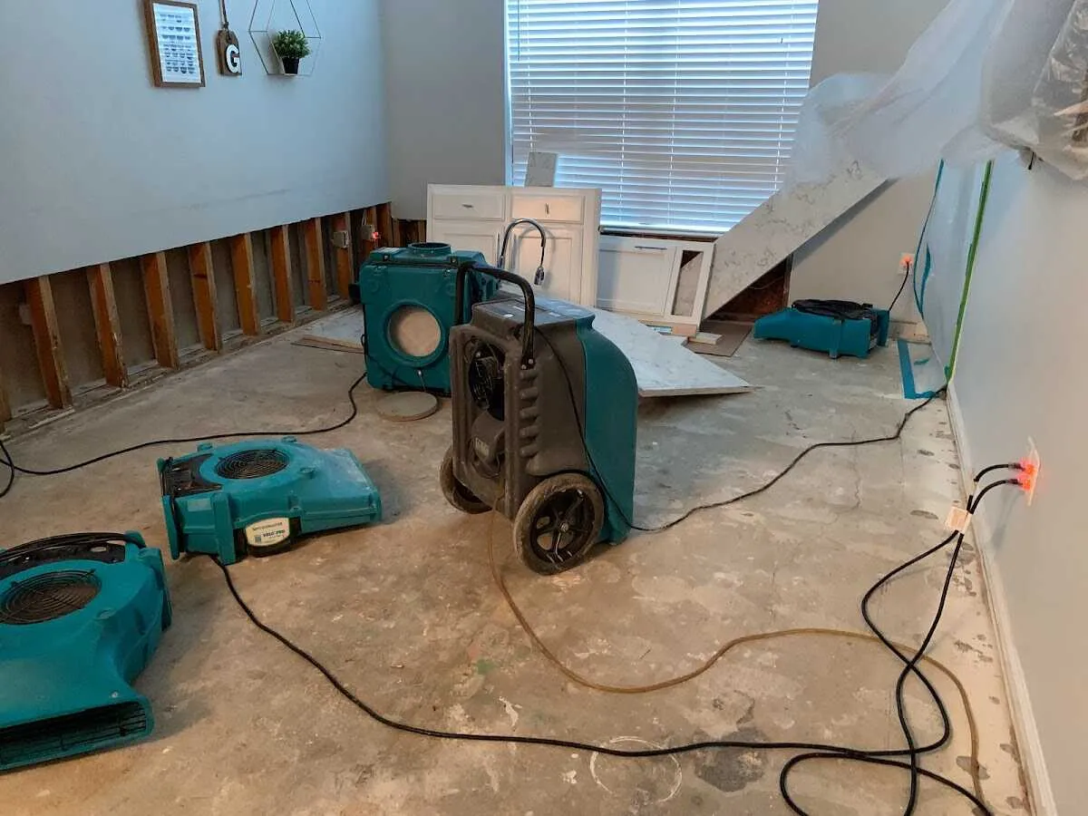 Dehumidifier in flood-cut room for Water Damage Restoration in Blaine